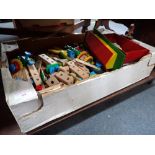 A WOODEN NOAH'S ARK with animals and a collection of wooden Brio construction blocks in the style of