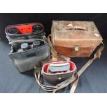 A COLLECTION OF VINTAGE BINOCULARS, and a leather camera case