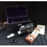 A VINTAGE 'MAGAZINE CINE-KODAK' CINE CAMERA with case