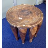 A 19TH CENTURY AFRICAN TRIBAL ROUND TABLE, 51cm dia