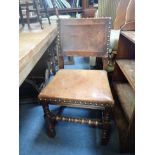 A SET OF FOUR OAK AND LEATHER UPHOLSTERED CHAIRS in the Cromwellian style