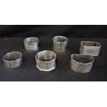A COLLECTION OF SILVER NAPKINS RINGS, approx 7.7 oz