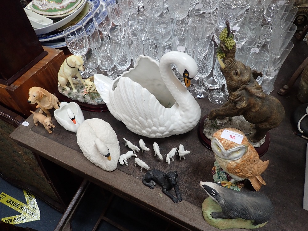 A BESWICK OWL, an Aynsley badger, an Aynsley Mute Swan and similar animals