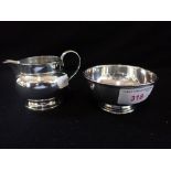 A SILVER CREAM JUG and a sugar bowl, approx 7.4oz