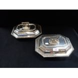 A PAIR OF SILVER PLATED LIDDED SERVING DISHES