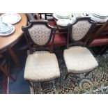 A SET OF FOUR LATE VICTORIAN SALON CHAIRS Shoolbred?)