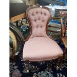 A VICTORIAN WALNUT FRAMED PARLOUR CHAIR