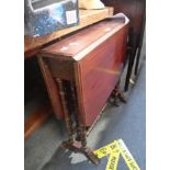 AN EDWARDIAN MAHOGANY SUTHERLAND TABLE