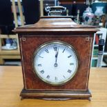 AN EARLY 20TH CENTURY BURR WALNUT CASED MANTEL CLOCK