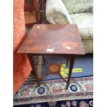 AN EDWARDIAN OCCASIONAL TABLE WITH POKER WORK DECORATIO