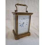 A 'MATTHEW NORMAN' BRASS CARRIAGE CLOCK