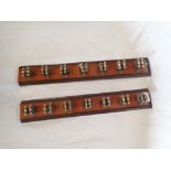 A PAIR OF VINTAGE SNOOKER CUE HOLDERS