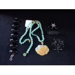 A "JADEITE" BEAD NECKLACE