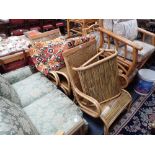 A PAIR OF COLONIAL STYLE BAMBOO AND WOVEN CANE CONSERVATORY ARM CHAIRS