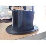 A VINTAGE BLACK COLLAPSABLE OPERA HAT