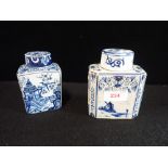 A DELFT TEA CADDY, 11.5cm high and another similar (2)