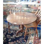 A 19TH CENTURY OAK TILT TOP TRIPOD TABLE