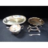 A SILVER PLATED WAITER