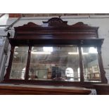 A LATE VICTORIAN MAHOGANY FRAMED OVERMANTEL MIRROR