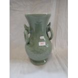 A CHINESE GREEN GLAZED CELADON VASE, 32cm high (drilled to base)