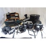 A LARGE COLLECTION OF CAMERAS