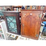 AN 18TH CENTURY WALNUT HANGING CUPBOARD