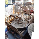 A TEAK OCTAGONAL GARDEN TABLE