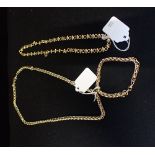 A COSTUME CHAIN LINK NECKLACE AND MATCHING BRACELET