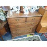 A GEORGE III MAHOGANY CHEST OF DRAWERS