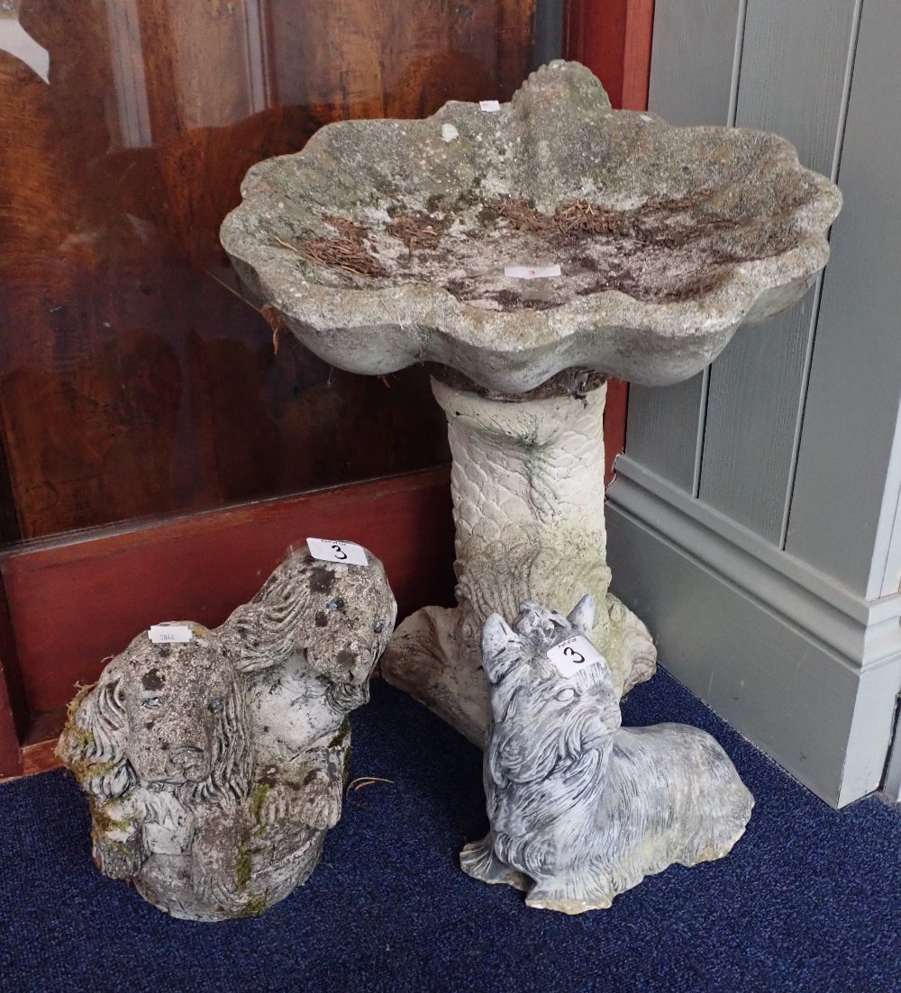 A RECONSTITUTED STONE BIRD BATH