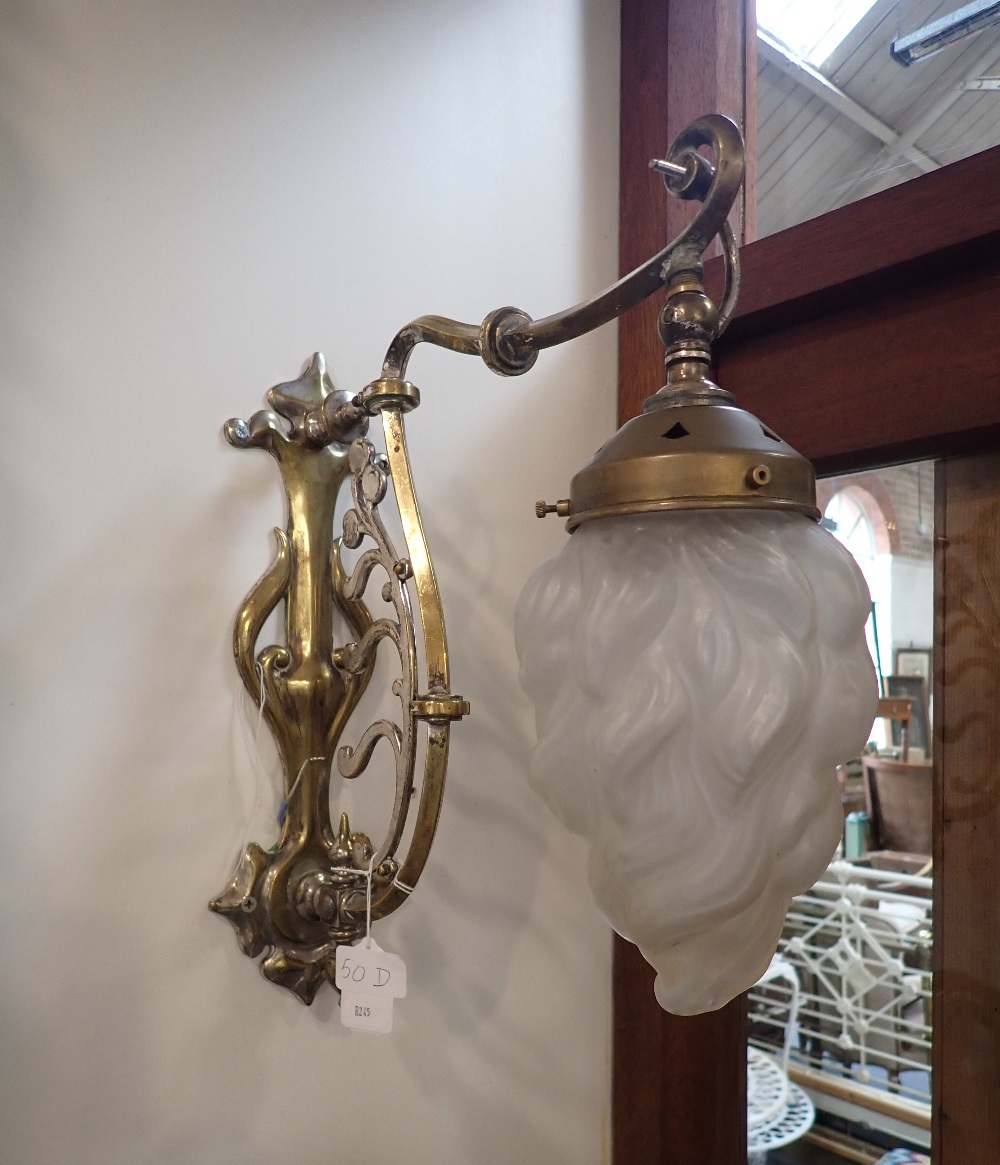 A BRASS AND NICKEL PLATED ART NOUVEAU ELECTRIC WALL LIGHT