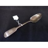 A SILVER SERVING SPOON