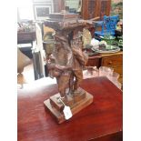 A PAIR OF 17TH CENTURY FLEMISH STYLE CARVED OAK FIGURAL FURNITURE MOUNTS