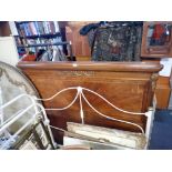 AN EARLY 20TH CENTURY WALNUT FRENCH BEDSTEAD