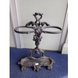 A CAST IRON UMBRELLA STAND