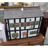 AN EXTENSIVELY RESTORED AND FURNISHED TRIANG DOLLS HOUSE