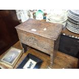 A CARVED OAK MINIATURE COFFER