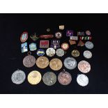 A COLLECTION OF BADGES AND MEDALS