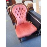 A VICTORIAN BUTTON BACK CHAIR