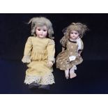 A BISQUE HEAD SCHOENAU & HOFFMEISTER DOLL