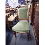 A SET OF FOUR VICTORIAN OAK DINING CHAIRS w