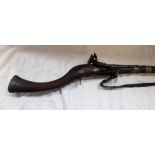 A 19TH CENTURY JEZAIL FLINTLOCK RIFLE