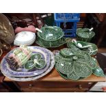 A COLLECTION OF CABBAGE LEAF SHAPED SERVING DISHES