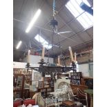 A WROUGHT IRON GOTHIC STYLE SIX BRANCH CHANDELIER