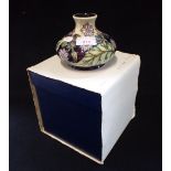 MOORCROFT; A SQUAT VASE