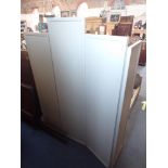 A FOUR FOLD PAINTED SCREEN