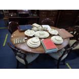 A VICTORIAN FIGURED WALNUT LOO TABLE