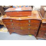 A GEORGE III MAHOGANY SERPENTINE CHEST OF DRAWERS