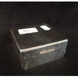 A SILVER CIGARETTE BOX