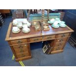 A LATE VICTORIAN LIGHT OAK PEDESTAL DESK